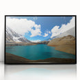 Large abstract wall art depicting a stylized Nepalese landscape in muted earth tones, framed in black acrylic.