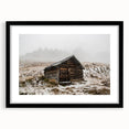 Abstract art print of Adelaide scenery in vibrant colors on a black framed mat, ideal for living room decor.
