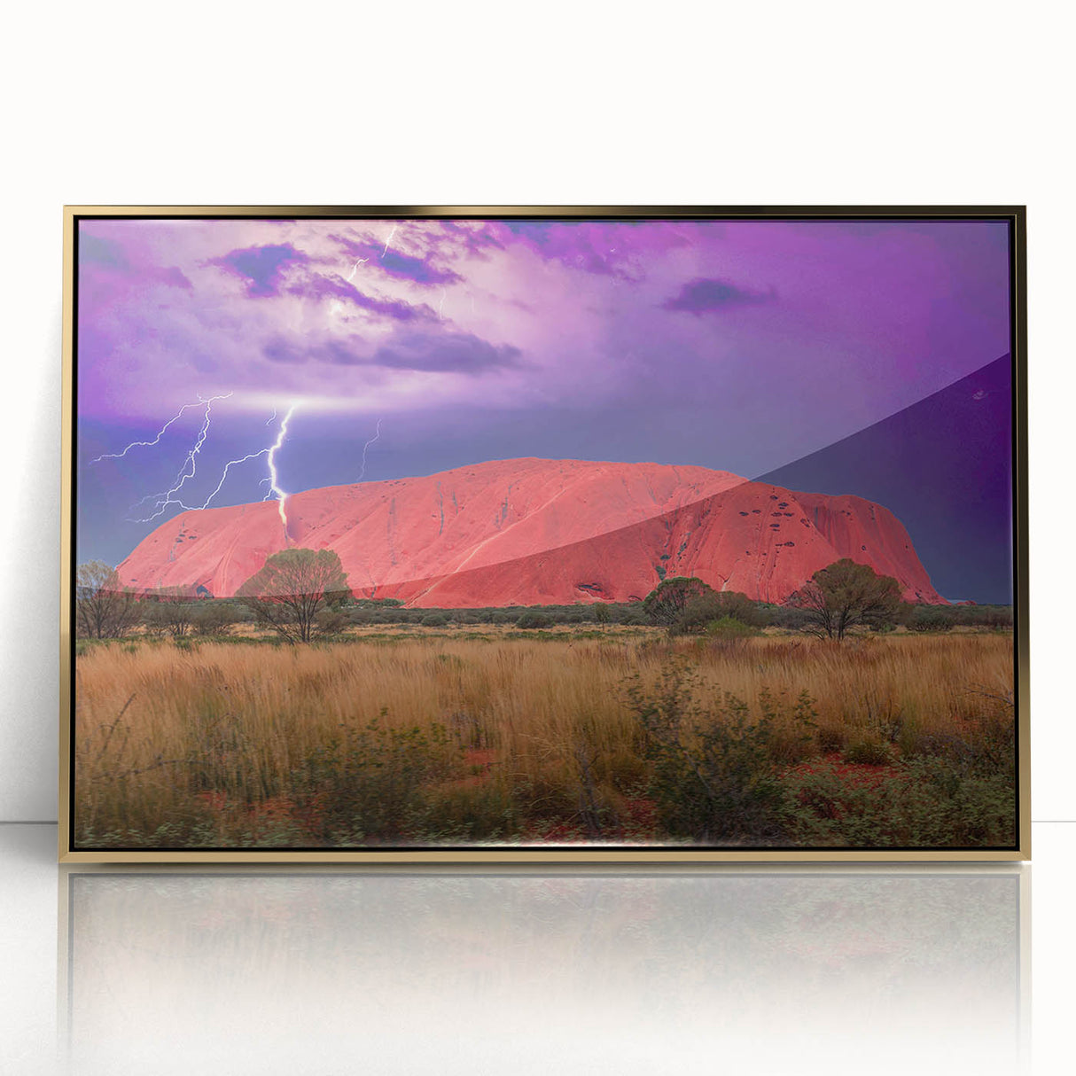 Mid-century modernist art of Ayers Rock in muted earth tones on a framed acrylic print, suitable for nursery wall art.