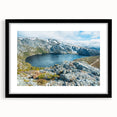 Abstract art print depicting a vibrant, textured landscape of Tasmania on a large canvas, framed in black.