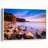 Vintage poster art of a Newfoundland scenery on a framed canvas, featuring a palette of colorful art.