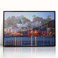 Large abstract wall art depicting a Nova Scotia scenery in muted blue and green tones, framed in black acrylic.
