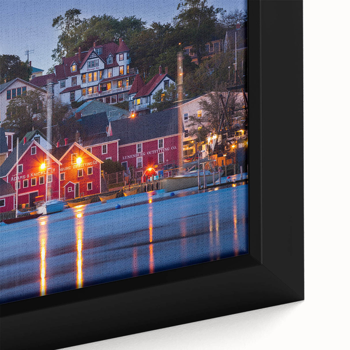 Framed canvas depicting a textured, colorful Nova Scotia scenery in black with vibrant accents, ideal for living room decor.