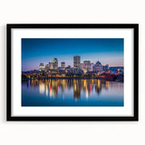 Abstract art print of vibrant, colorful scenery depicting Quebec, on a large textured canvas with a black frame.