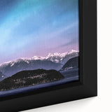 Close-up of a black wall art depicting Yukon scenery on a framed canvas, featuring textured.