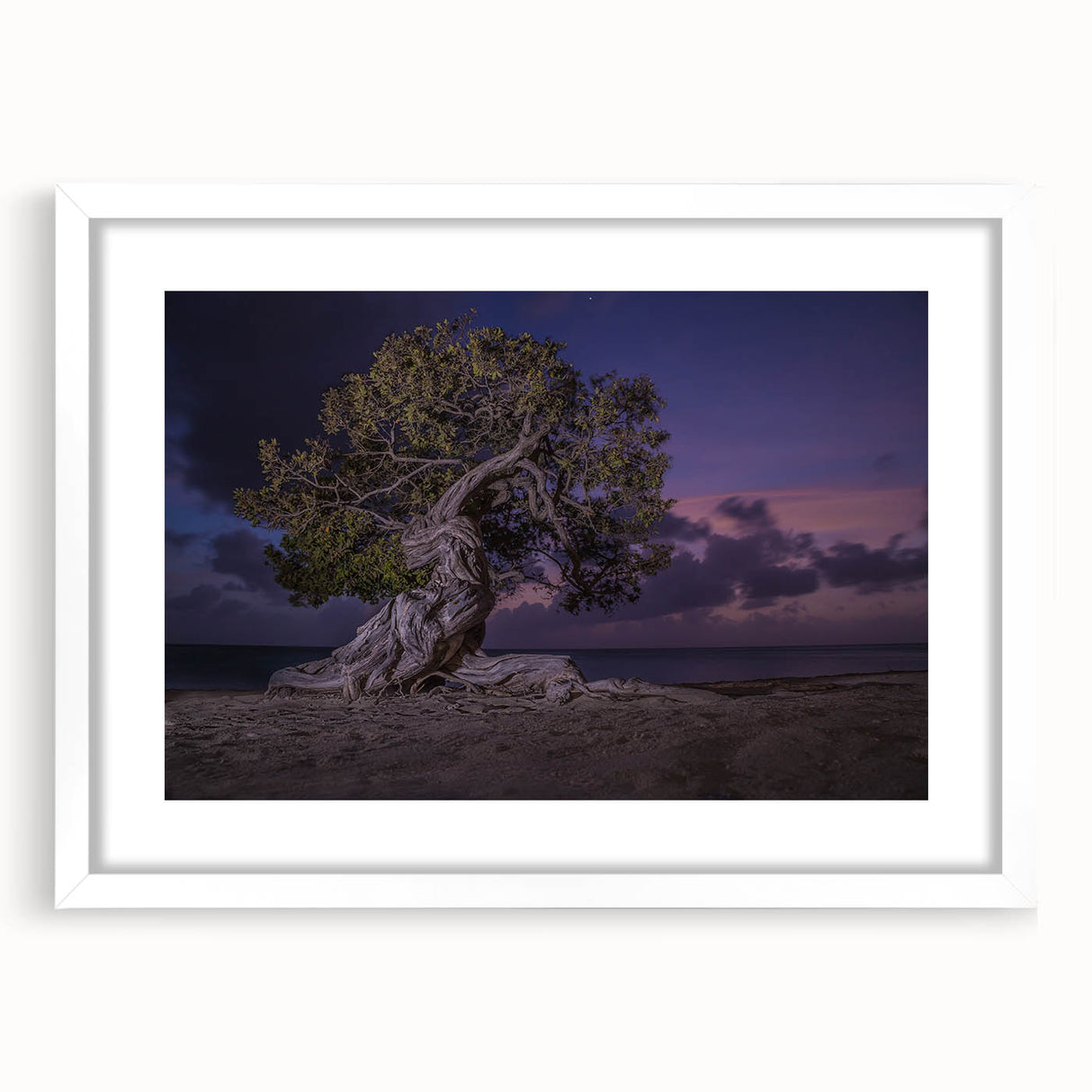 Textured abstract art print depicting a serene Caribbean scene in muted blue and white tones, framed with a white mat.