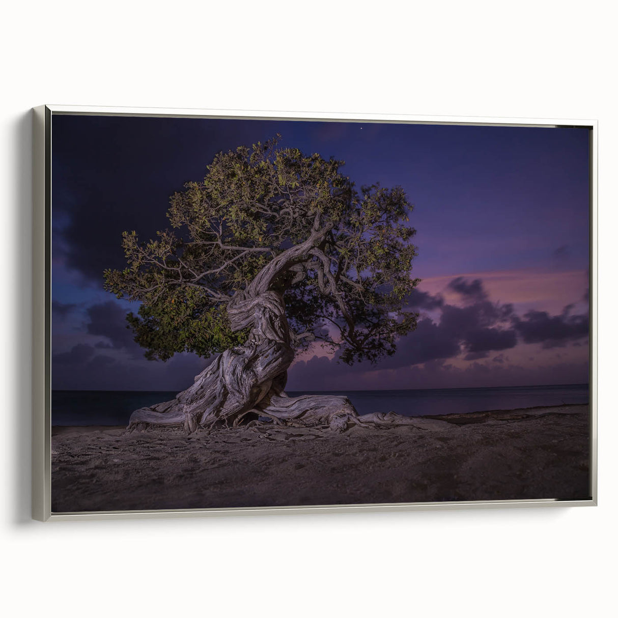 Framed canvas featuring a vintage-style landscape painting of a colorful Caribbean beach.