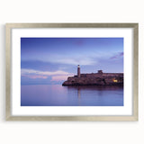 Extra large abstract art print of a Caribbean scene in textured hues of blue and green, framed in silver.