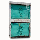Large abstract wall art of a Caribbean scenery in vibrant blue and green hues on acrylic glass.