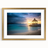 Textured art depicting an abstract, Caribbean-inspired landscape in vibrant blues and greens on a framed canvas.
