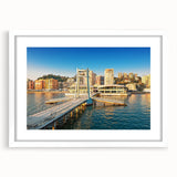 Textured abstract art print depicting a European scenery in muted earth tones, framed in white, ideal for bedroom art.