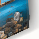 Large abstract wall art of a European Cyprus scenery in muted green and blue tones on acrylic glass.