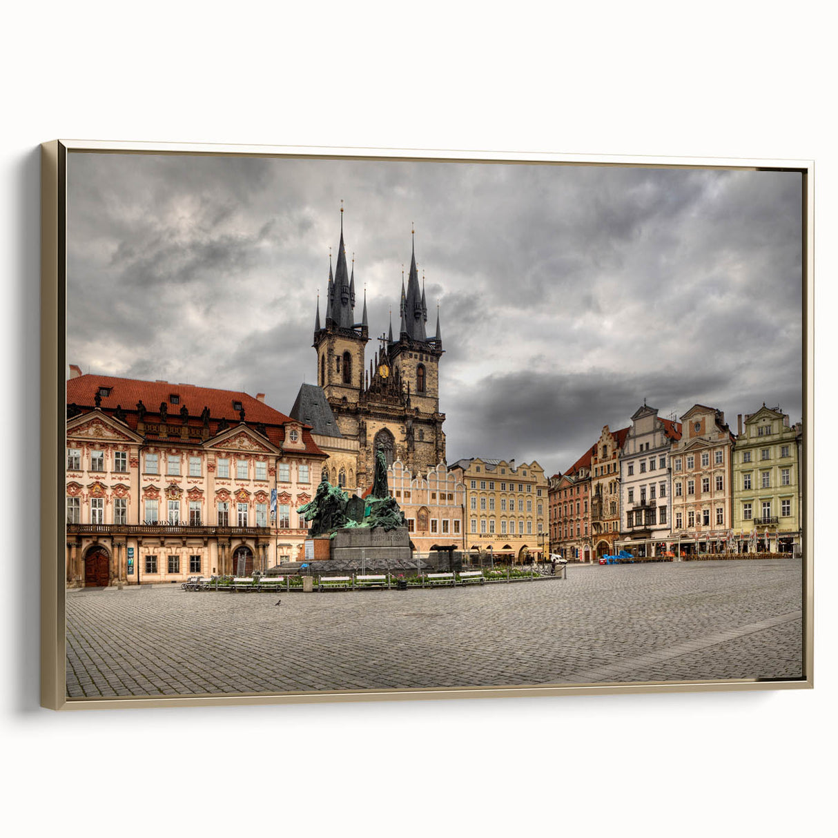 Framed canvas wall art depicting a vintage-style Prague landscape in muted gold and black tones, ideal for bedroom decor.