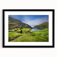 Colorful abstract art print of a European scenery in muted tones on a large framed canvas, suitable for living room decor.