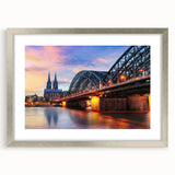 Extra large wall art featuring an abstract depiction of a European landscape in textured gray and blue tones.