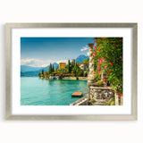 Extra large wall art featuring an abstract depiction of Lake Como in muted blue and green tones, framed in silver.