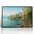Large abstract wall art of Lake Como in muted blue and green tones, framed in black acrylic.