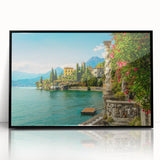 Large abstract wall art of Lake Como in muted blue and green tones, framed in black acrylic.