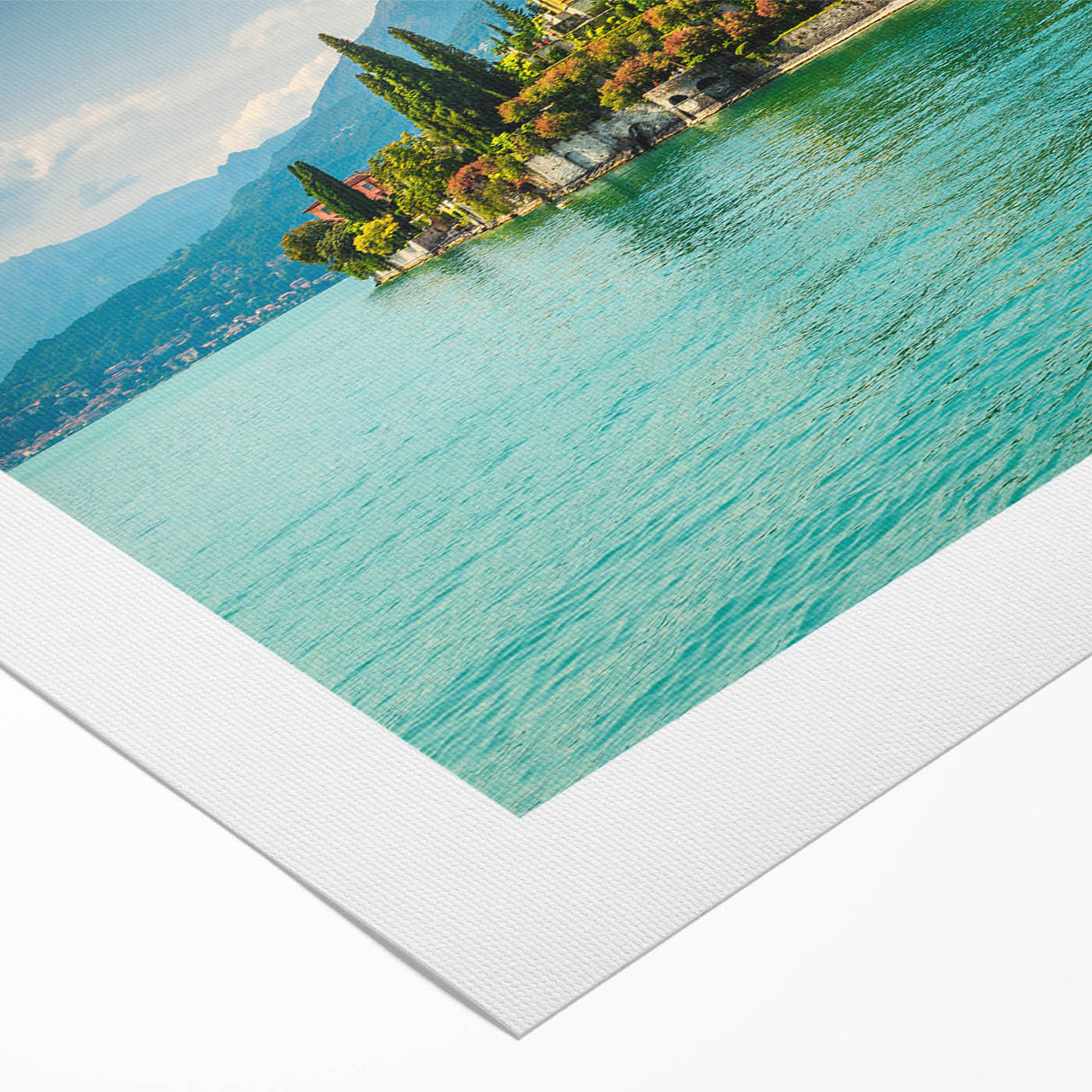 Art deco poster of Lake Como with muted blue and green hues on rolled canvas, suitable for dining room wall art.