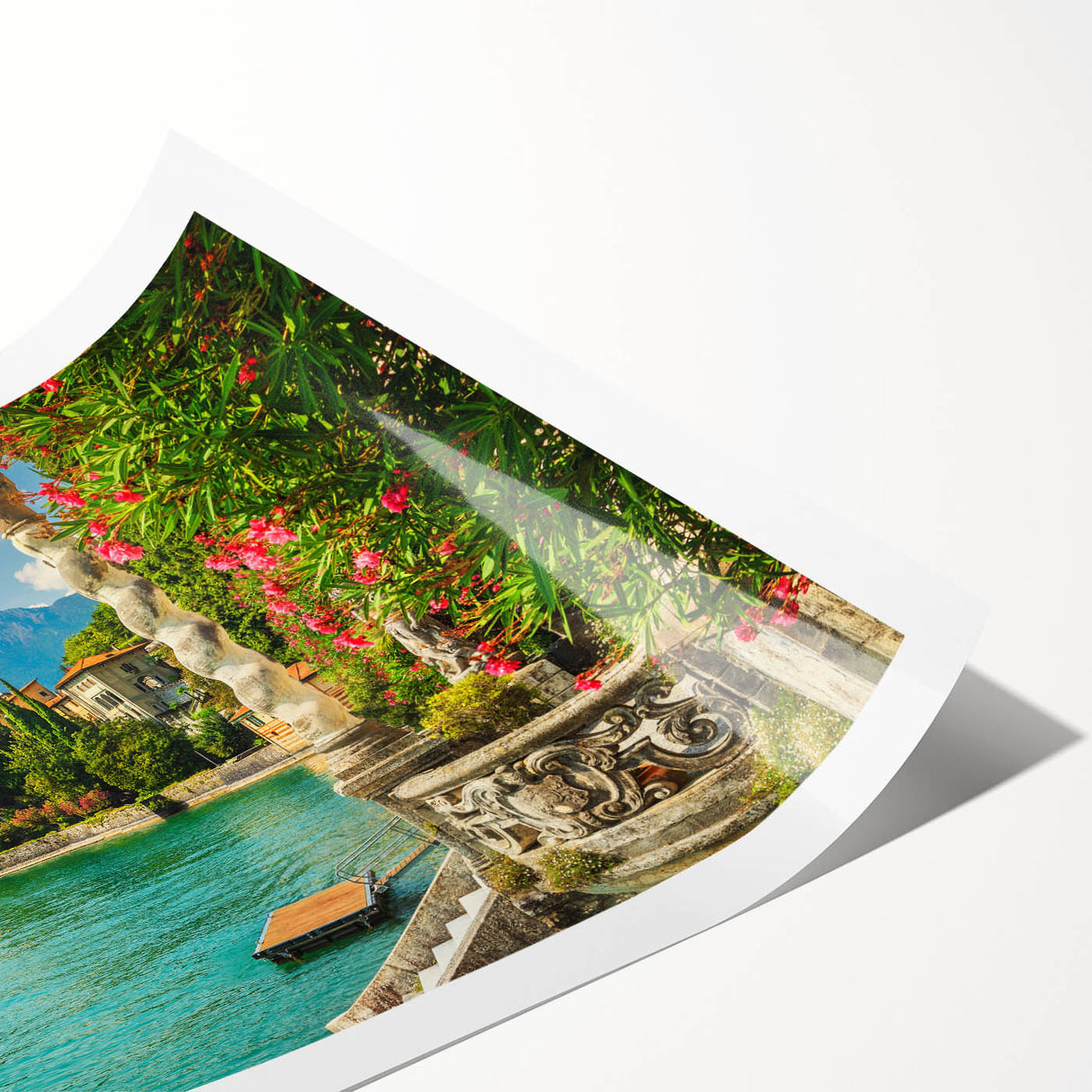 Extra large wall art of Lake Como with subtle line art flowers in pastel shades on a rolled print.