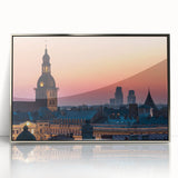 Large art print of a serene Latvian landscape, in muted green and blue tones on a silver-framed acrylic.
