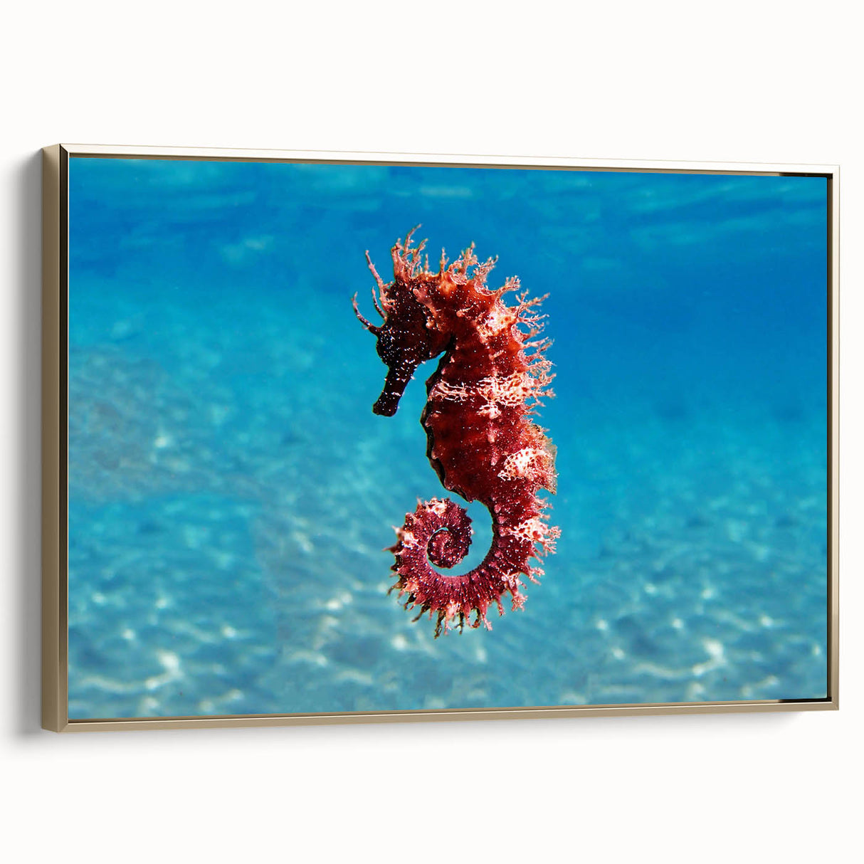 Framed canvas depicting a serene Mediterranean seascape with muted blue and gold tones, ideal for bedroom wall art.