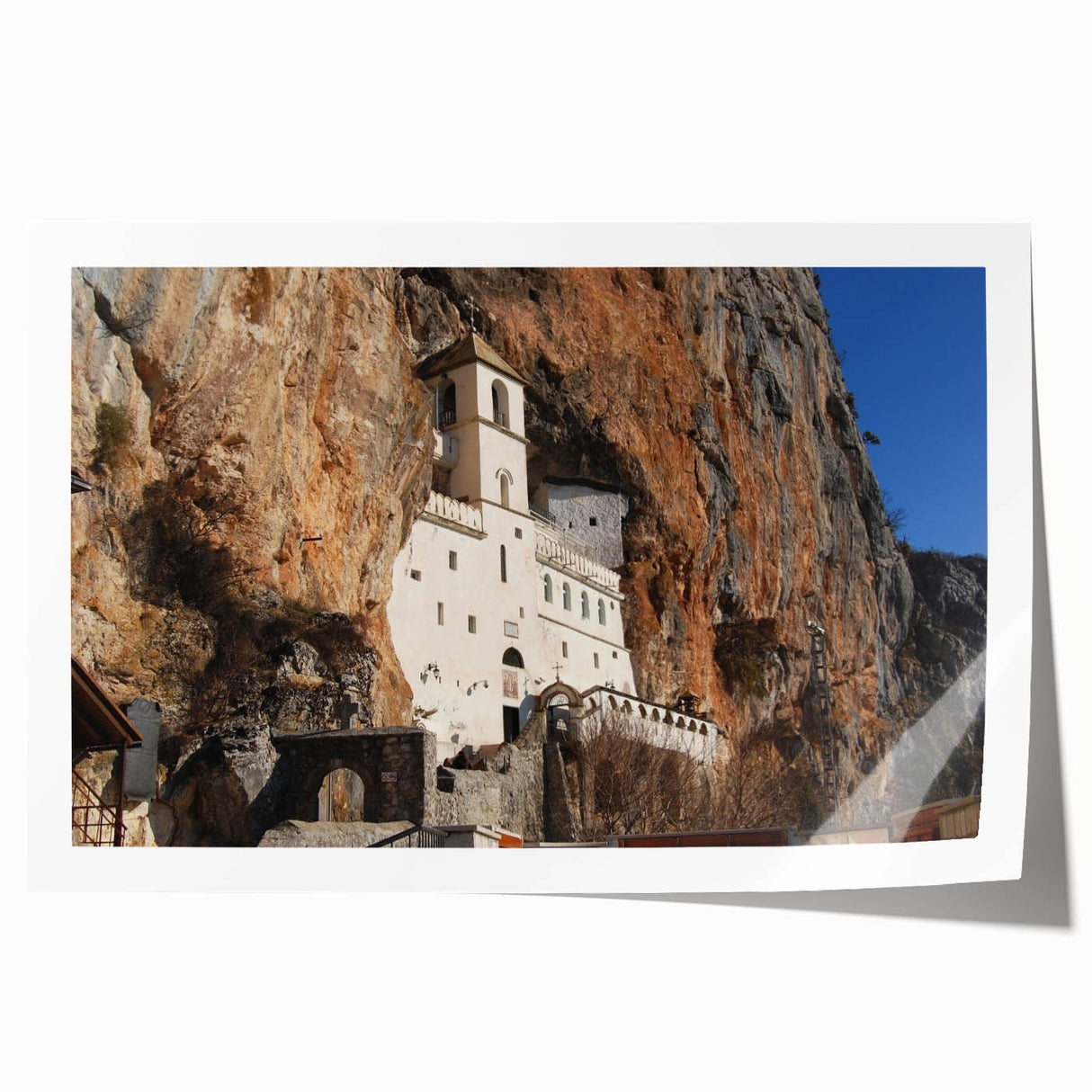 Rolled print of a Montenegro landscape with lush greenery and floral elements, ideal for dining room wall art.