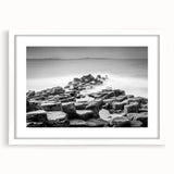 Textured abstract art print depicting a Northern Ireland scenery in muted earth tones on a white-framed canvas.