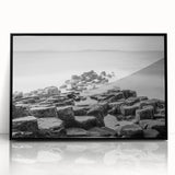 Large abstract wall art depicting a Northern Ireland landscape in muted green and blue tones, framed in black acrylic.