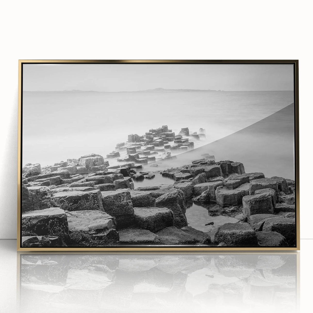 Art deco poster of Northern Ireland scenery in muted green and gold, acrylic framed, suitable for modern nursery decor.
