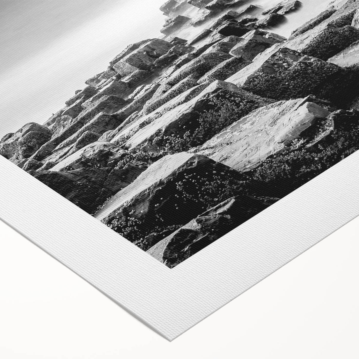 Art deco poster featuring a serene Northern Ireland landscape in muted green and blue tones on rolled canvas.