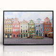 Large abstract wall art depicting a European scenic view in muted earth tones, framed in black acrylic.