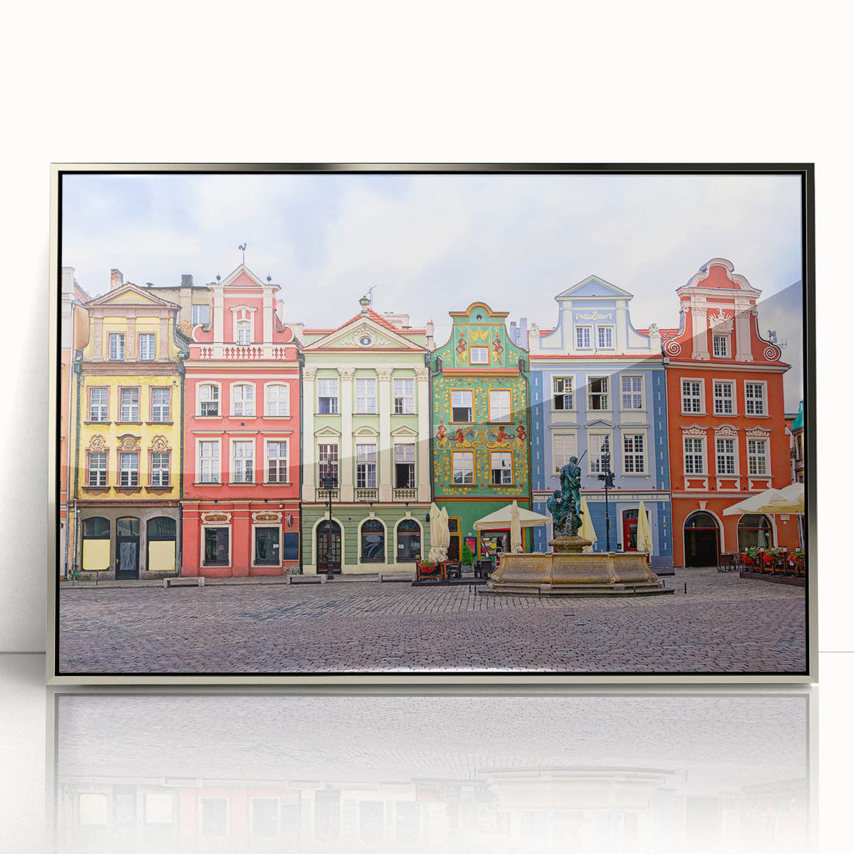 Large art print of a European cityscape in muted colors on a framed acrylic, suitable for modern nursery decor.