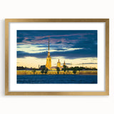 Abstract art print of a European cityscape in gold frame, featuring muted earth tones, ideal for dining room decor.