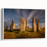 Vintage poster art of a Scottish landscape on a framed canvas, featuring muted earth tones, ideal for living room decor.
