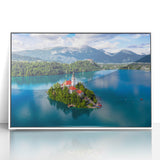 Large acrylic print of a Slovenian landscape in muted earth tones, framed in white, suitable for modern nursery decor.