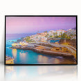 Large abstract wall art depicting a vibrant, colorful European scenery on black-framed acrylic.