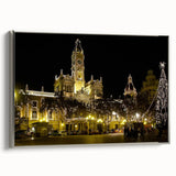 Framed canvas featuring a vintage-style landscape painting of Valencia, with vibrant colors and silver frame.