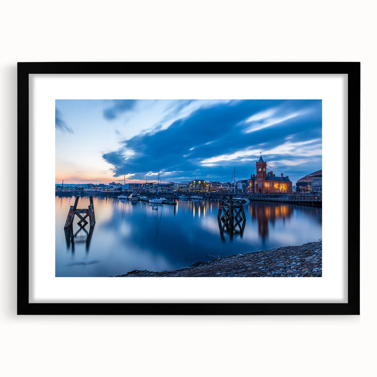 Extra large abstract art print of a colorful, textured European scenery on a black framed canvas.