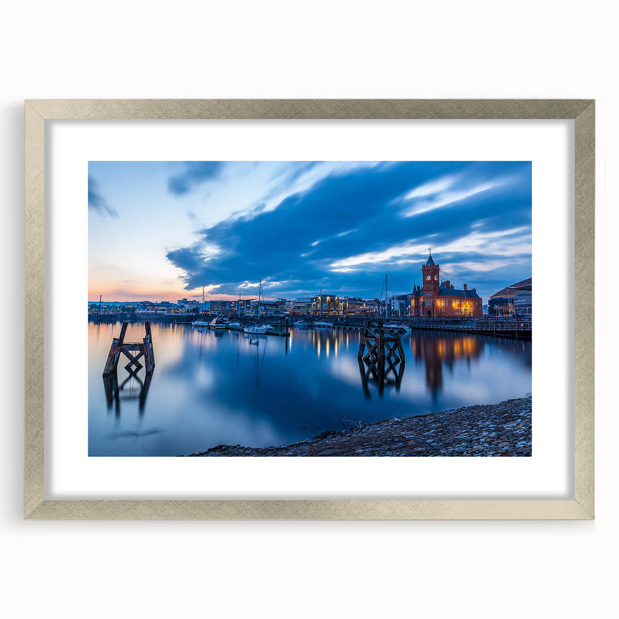 Textured abstract art print of a Welsh landscape in muted green and blue, framed in silver, suitable for bedroom wall decor.