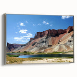 Framed canvas featuring a vintage landscape art painting of a Middle Eastern scenery in colorful hues.