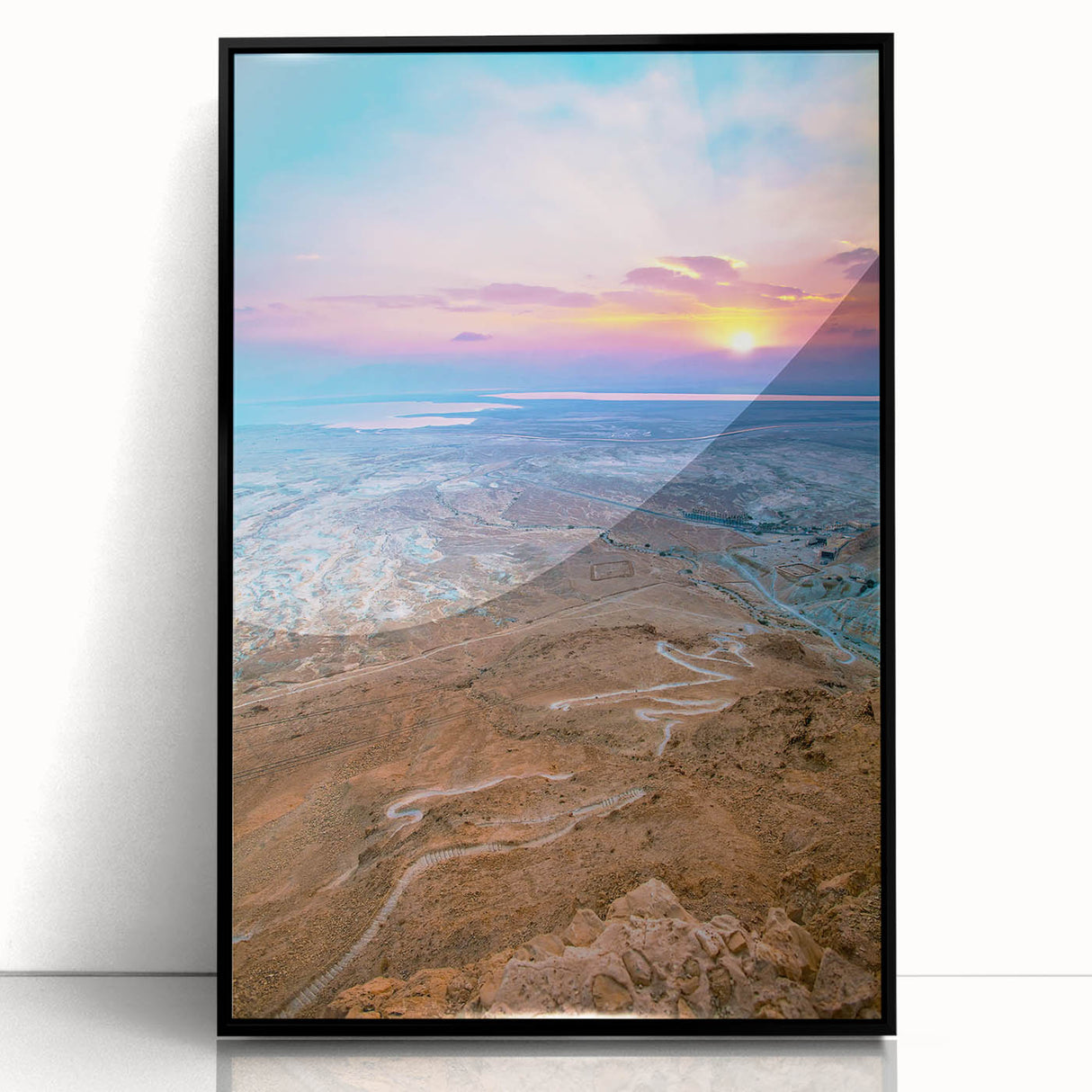 Large abstract wall art depicting a Middle-Eastern scenery in muted earth tones on a framed acrylic.
