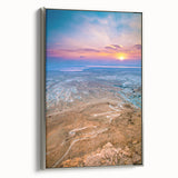 Framed canvas featuring a vintage-style landscape painting of a Middle Eastern scenery in colorful hues.