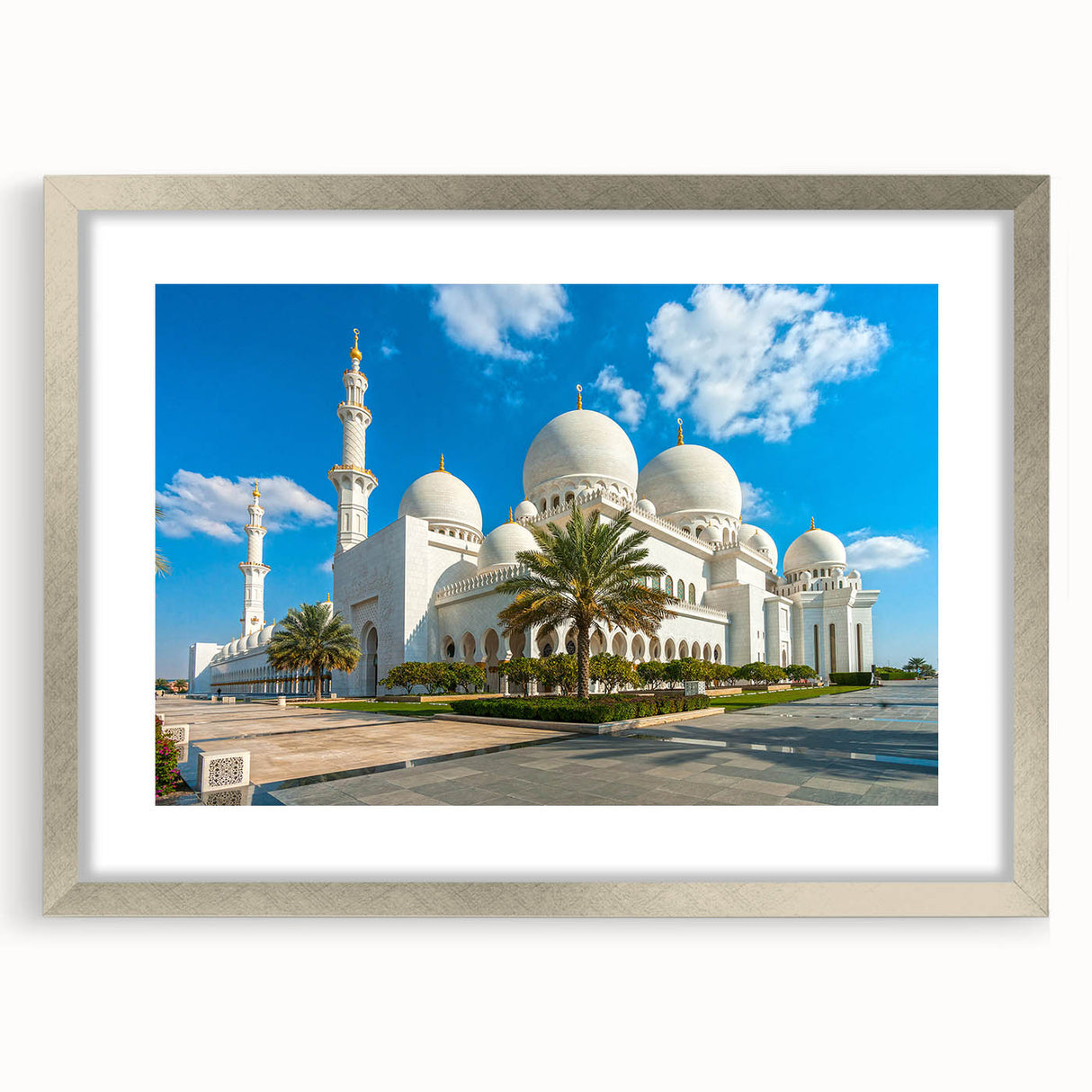 Textured abstract art print of a muted blue and grey Emirates skyline on a framed silver mat, suitable for bedroom decor.