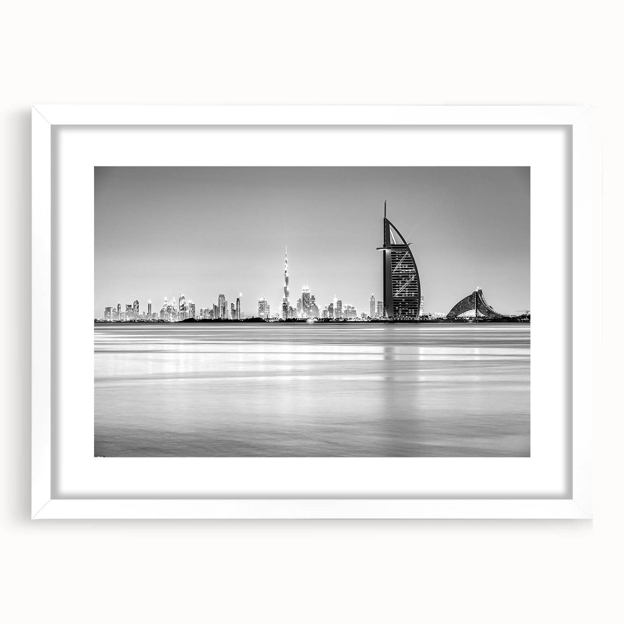 Abstract art print of Burj Al Arab in muted blue and gray, framed with a white mat.