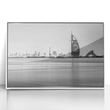 Acrylic print of the Burj Al Arab with soft blue sky, ideal for modern art wall decor in a living room.