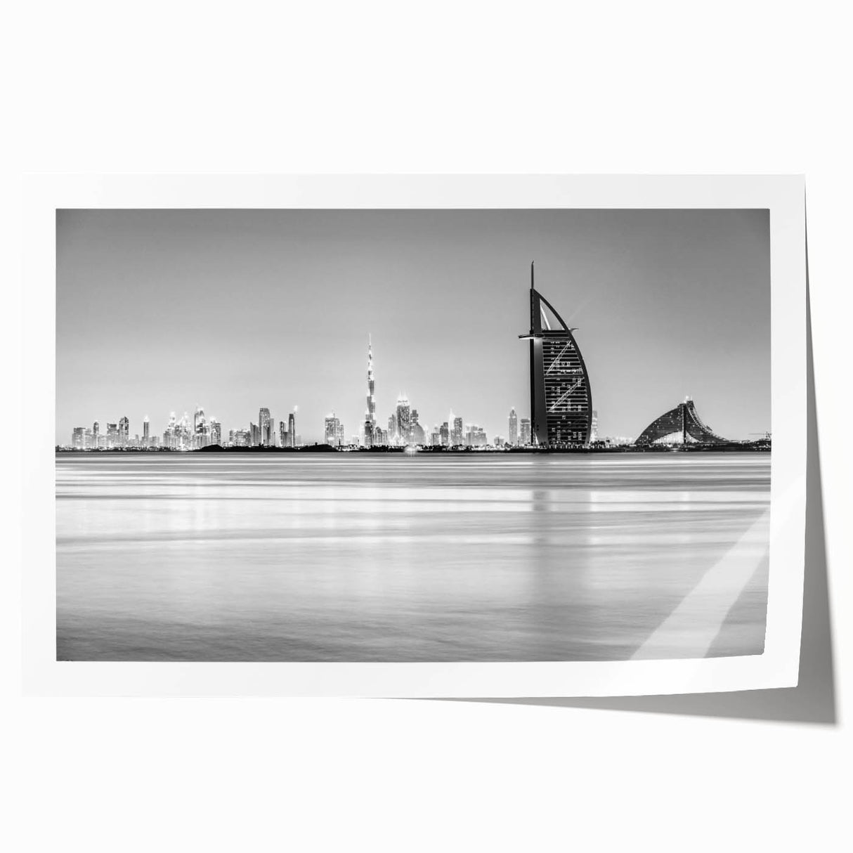 Extra large wall art featuring the Burj Al Arab in vibrant sunset hues on a rolled canvas, ideal for dining room decor.