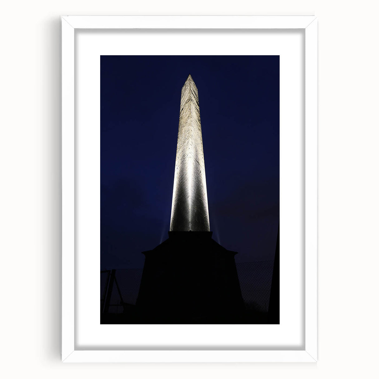 Abstract art print of Wellington skyline in muted blue and grey tones on a white framed canvas.