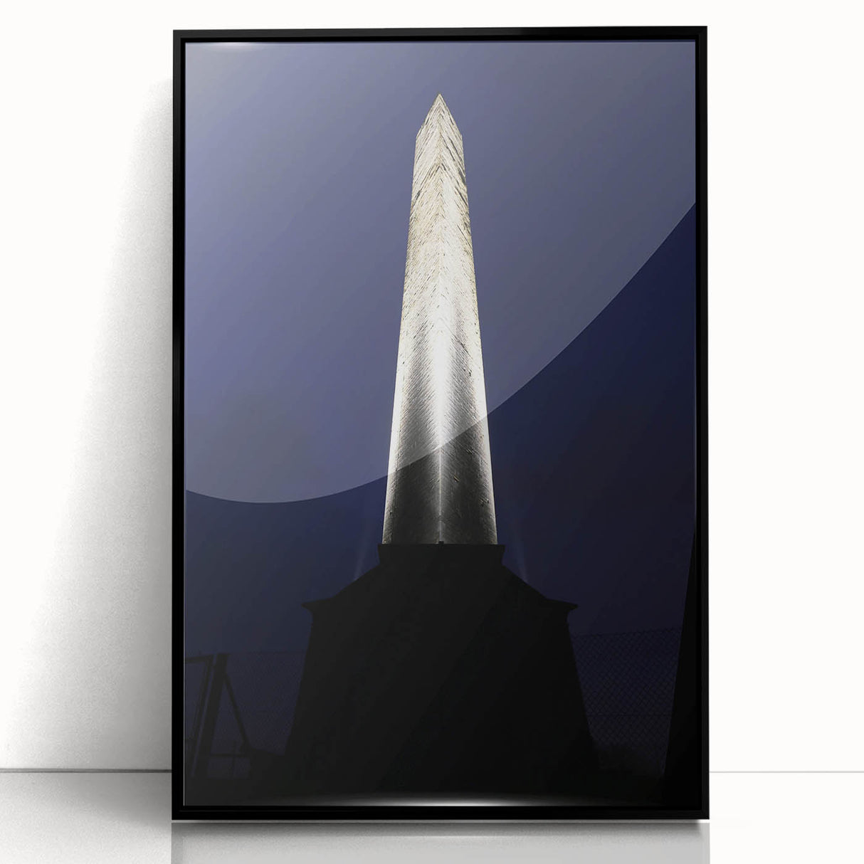 Large abstract wall art depicting Wellington's coastline in muted blue and gray tones, framed in black acrylic.