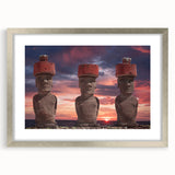 Textured art of Easter Island statues in muted earth tones on a framed canvas, suitable for bedroom decor.
